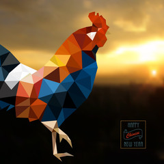 Polygonal style Rooster on sunrise - symbol of 2017