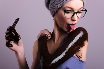 beautiful hipster girlfriend or wife dirty with chocolate in the
