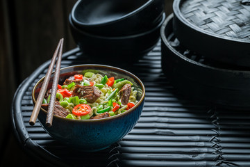Enjoy your asian noodle with vegetables and beef