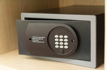 Safe box and wood wardrobe in hotel