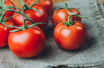 Fresh grape tomatoes with spices for use as cooking ingredients. Healthy eating.