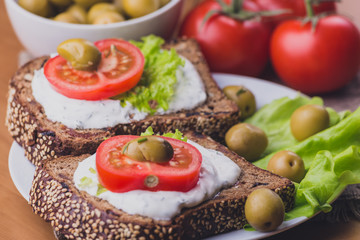 Healthy and Vegetarian diet breakfast concept. Homemade bread with cheese cream