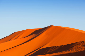 Fototapeta na wymiar Sand dunes in Sahara desert in Morocco, Africa