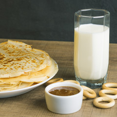 milk with pancakes and honey.