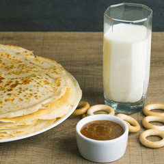 milk with pancakes and honey.