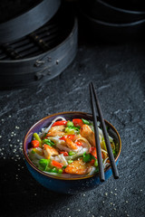 Delicious noodle with chicken, vegetables and chili peppers