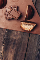 broken chocolate, biscuit biscuits, wooden...