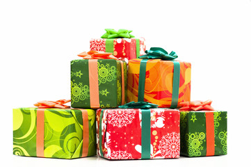 Five different color present boxes in pyramid. Isolated on white background and closed