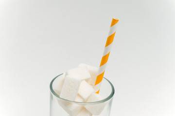 cubes of sugar, marshmallows in a glass