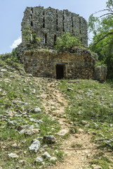 sight of the temple in ruins of the pyramid in the Mayan archaeological enclosure of Sayil, Yucatan, Mexico