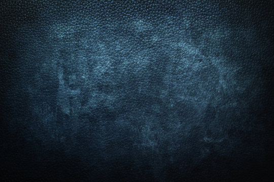 dark blue leather background or texture