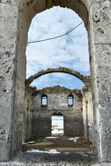 Ruins of the old Eastern Orthodox church of Saint Ivan Rilski abandoned at the bottom of Zhrebchevo Dam Lake during the communist regime in Bulgaria