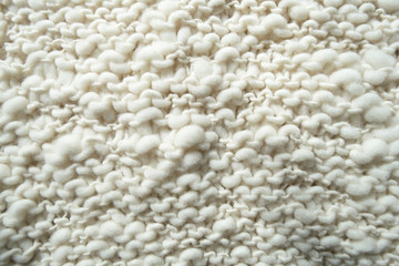 White knitted woolen fabric