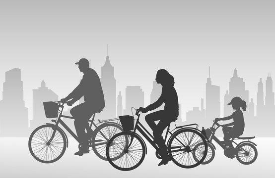 family riding bicycles silhouettes - vector