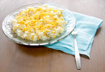 Festive salad with chicken breast, sweet corn, cheese and pineap