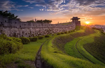 Raamstickers Hwaseong Fortress in Sunset, Traditional Architecture of Korea at Suwon, South Korea. © panyaphotograph