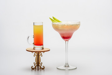 cocktails: sex on the beach and margarita on decorative table