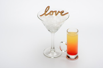 coctail sex on the beach with love inscription and wineglass