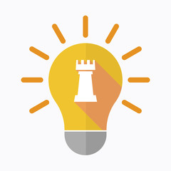 Isolated light bulb with a  rook   chess figure