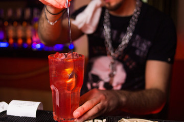 alcoholic cocktail is pours