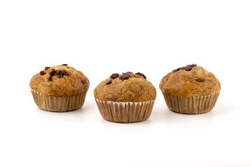 home-made blueberry muffins, muffin cup cake closeup isolated on white background.