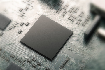 central processor unit on mainboard closeup in the blur, tiltshift effect