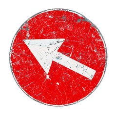 Old road sign with white arrow on red background