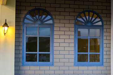 Obraz premium two big windows on the wall decorate with lantern, luxury style