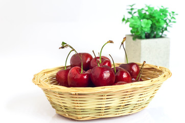 cherry in basket on white background
