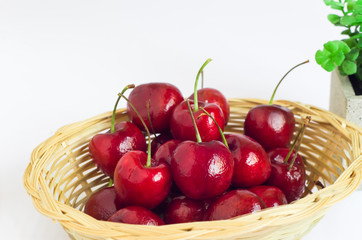 cherry in basket on white background