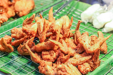 Delicious fried chicken meat with sticky rice, Thai food