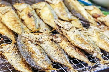 Thai fried mackerel for sell in the floating market