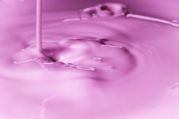 Bright purple liquid with the consistency of milk
