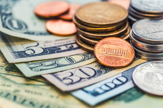 Still Life with cash dollars and cents US.