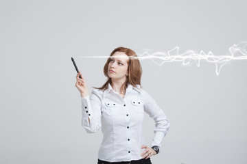 Woman making magic effect - flash lightning. The concept of copywriting or writing.