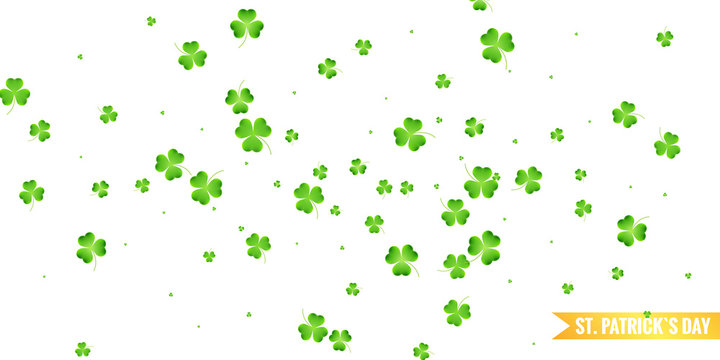 Saint Patrick's day clover background. Flying shamrock leaves.