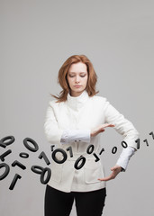 Woman working with binary code, concept of digital technology.