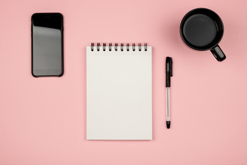 Minimal flat lay style picture of blank notebook page with different objects
