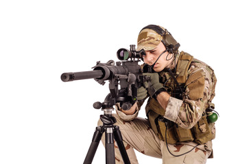 Portrait soldier or private military contractor holding sniper rifle.