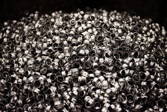 Close up of a barrel of metal pellets