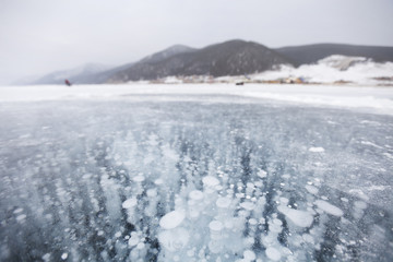 bubbles in ice. Baikal lake. Winter landscape