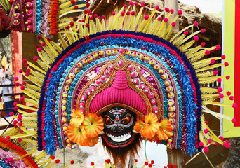 Attractive mask of god and goddess; dancers wear masks, bright costumes and dance on particular occasion.