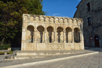 Fototapeta na wymiar Fontana Fraterna, ancient and famous all in stone fountain, historic center of Isernia, Molise, Italy