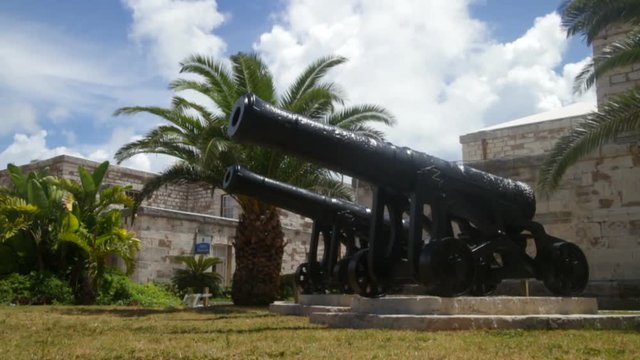 Two black antique cannons in the British Navel Dockyard in Bermuda.