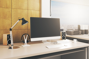 Desk with blank computer