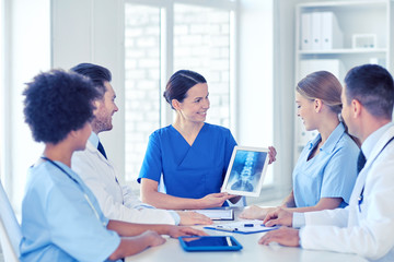 group of happy doctors meeting at hospital office