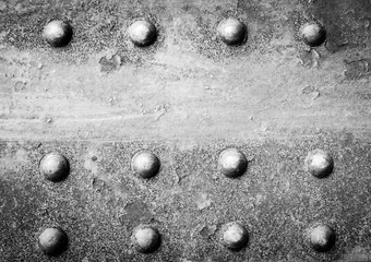 Old rusted steel - rusty metal texturee. Big rusty metal plate, rust and corrosion. Bolts