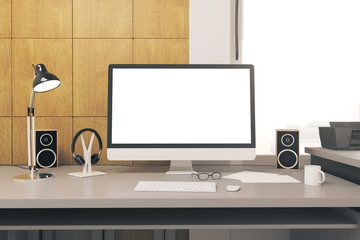 Desk with blank computer