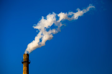 Smoke rolls up from the chimney