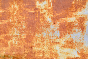 Texture of gray metal surface covered with orange rust.